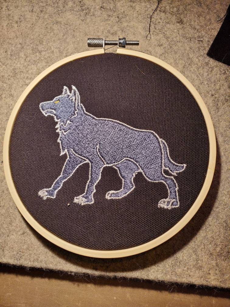 Perrin Goldeneyes Wolf embroidery hoop wall decoration. Wheel of Time inspired